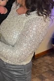 Beautiful top! Runs a little too tight and does get caught on things but the price you pay for sequins! - Suzanne F.