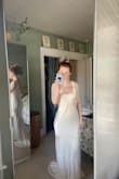 I feel like a million dollar bride in this dress. The material is buttery soft. I think I could've done an xs because it's a little long and a little loose in my midsection but I'm a last minute shopper so we are gonna rock with it. Can't wait to wear at my wedding reception. Thank you Lulus, you never disappoint - Maureen F.