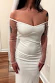 I ordered a small and the only issue was that I didn't like how much cleavage was shown. If I moved the dress up it appeared my girls didn't fit in the small cup lining. The material is AMAZING, the pearl detail is gorgeous as well. - Alisha F.