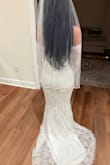 I was looking for a vintage/elegant style dress and this may just be the one! I should've ordered a small, but the medium is still great. I'm currently getting it altered to tighten the waist & behind the knee area for more of a mermaid look. The lace detail is beautiful and art deco! The dress seams under the lace appear to be inside out as in the seam is showing what typically would be on the inside of the dress so I'm having that altered. I truly love this dress and can't wait to wear it once it fits - Alisha F.