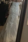 I'm getting married in May in an outdoor wedding. I am having trouble with the whole "spending thousands" on a dress that's going to be worn once and never looked at again. I saw this dress and it was exactly what I wanted so I figured why not. It came in and it's perfect. The material does not look cheap, I will have to take it in a little in the back but I could not go any smaller with the bust. The boning is strong enough to hold me up with no bra, which never happens. Perfect dress! I would recommend - Kristin S.