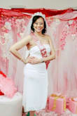 I wore this dress to my bridal shower and everyone loved it. It fit true to size and the bow was amazing! - Toyka C.