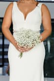 everything [about] this dress was perfect; it fits perfect. I just made some changes on the back. Also, I placed a belt in the front. - Pamela Q.