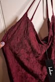 The dress looks great on and the dark red color is very pretty. However, the threads in the lace layer are already coming loose (delivered that way) So the quality is a bit iffy. The boob region is also smaller than people's boobs might be. It's also a bit long on my short self, but not too long to get in the way. - Tulika S.