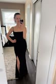 I was having a bad day before I tried this dress on, but it took that away! It fits exactly as it's pictured, but I wasn't expecting the added bonus of the material being stretchy and soft. I personally didn't think the slit was too high like some other reviews said, but itll show a bunch of leg when you sit down. But the look was exactly what I was going for, and I love the corset top. It snatches in your waist, but it could be tough for anyone with a large chest size. Overall, a really pretty wedding guest dress! - Kelly C.