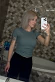 I've been trying to get this shirt for a while because I thought it would be a nice addition to my closet, but it's always sold out! I'm so glad I kept checking to see if it was in stock. It's very flattering on. It doesn't show too much stomach. I was worried the x small would be too small, but honestly, it's perfect for the fit I tend to like. - Amanda S.