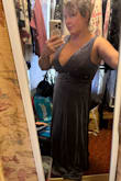 The dress fits great and it's comfortable! It's pretty low cut, and it's long. But I'm going to hem it myself and I might use some of the fabric from the hem to cover up some cleavage. I love it. - Ann L.