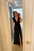 The sizing was perfect and more than long enough with 2 inch heels. The dress is just as pretty as I thought it was online. Only thing that is odd is the slit is directly in the middle. It allows you to choose which leg it's on but must be careful if you lift up your dress to walk!! - Samantha P.