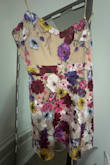 Similar to what another person said in their review, there are minimal flowers in the bust area making it look completely different than the dress the model is wearing. It makes the flower distribution look uneven and not flattering at all. There should be a disclaimer in the description so we know it may or may not come as pictured. Love the overall idea of the dress but not for me ALSO the beige under layer is only for a specific group of people; options for other skin tones would make sense...should be the standard - Kara J.