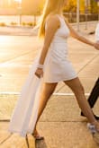 This dress fit so perfectly and was so fun! I loved the detachable train. I wore it for my engagement pictures, got many compliments on the dress! - Liz P.