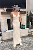 This dress was stunning! I loved every aspect of it. In the end, it was a little too long and I went with another option but the details were amazing and fit very well! There wasn't any boob padding so just take that into consideration. - Ariel B.