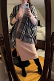 Such a fun sweater dress. Fits great and love the slit at the bottom. The fabric is quality and heavy enough too, kept me warm enough for New England snowy day and flattering. Paired with a poncho but mostly so I could wear it to work. - Evelyn C.
