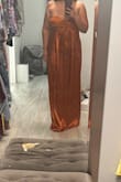 Color is pretty but the dress runs big. Does not fit. Too long - Priscilla A.