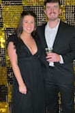 Loved this dress for charity event! The ruffles were perfect touch and reached ton of compliments. I did have the shoulders taken in a bit, and it kept my breasts in place better. It does show a bit more cleavage than used to but overall amazing dress!! - Lauren F.