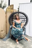 The dress was absolutely beautiful for my garden picnic themed baby shower! The dress was perfect. I'm 6 months pregnant so the bust area was a little smaller on me than my regular chest size, but other than that, everything fit perfectly even with the baby bump! - Yuliya P.