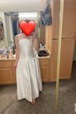 I purchased about 10 dresses from Lulu's, and this was my second favorite. I almost kept this. It would be perfect for any bridal event, a courthouse ceremony, or a beach wedding. It is so flattering! - Meg R.