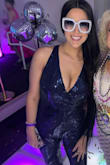 I wore this to a Studio 54 themed Mardi Gras ball and it was perfect. It's a compliment getter! Fits true to size with adjustable straps and a small amount of stretch to hug curves just right. Fur cuffs aren't as full as pictures show, but still looked good and photographed well. Highly recommend! - Grace V.