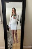 Purchased for my bridal shower this March. A little tight around the tummy and hips as it fits more like a body con dress, but I wouldn't size up as I think it wouldn't look as good. Very comfortable! You'll need either a bra that has very wide straps due to the box neckline or a strapless. I'm not well endowed in that area so I'm going to use the adhesive covers as it fits pretty tight on chest. - Lucy J.