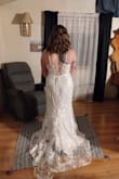 This dress is perfect for my reception dress! It has a beautiful lace detail and feels classy yet sexy. The dress does run small. I normally wear a large for Lulus dresses, but I had to exchange sizes and get an XL. The large fit everywhere except for about 3 inches of the zipper didn't close and the lace up top felt snug. The XL fits nicely with a little room on the hips. Overall, this dress is gorgeous and worth sizing up for! - Erika L.