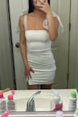 I love this dress, the material is thick + stretchy. Originally I ordered a size small and it was too big in the waist, so I got a size XS and it fit perfectly. - Tess D.