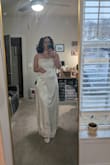 Does run a bit big, for me with wider hips fit great everywhere but a bit large in the bust. Considered trying a smaller size, but it's no longer on sale. Gorgeous quality and don't know what event I will wear it to, but have to keep! - Lindsay D.