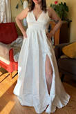 Beautiful and well made dress.  The bow in the back adds a ton a weight - if I had kept it, I wouldn't have had the bow.  It's tough to get past the wrinkles that it came with, but it's really a classy looking dress that could be perfect for someone else. - Erinn P.