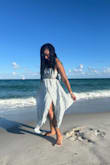 I wore this on my vacation to Florida. It was beautiful on the beach. Comfortable and flowy! I just felt better without the sleeves around my shoulders so I just tucked them into the dress. 10/10 I love it! - Christine N.
