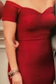 Truly felt beautiful in this dress. I am bigger in the waist and smaller in the hips.  I have a hard time finding dresses that fit my butt. This fit like a glove. No spanx required, dress material was thick and form-fitting. I'd buy in every color if I had other events to attend to! - Angela P.