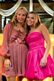 The dress was elegant with a sheer shimmer and the sleeves stayed full and not flat. The length was perfect for my 16yr old. She does have a small bust, so the open chest was not revealing at all and the design was perfect for her. She did not wear a bra, and the peek-a-boo bows were so cute. She wore it to her high school cheer banquest and got so many compliments. - Mandee K.