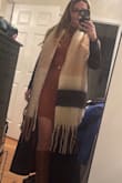 this is so cute and so warm. It's perfect for cold days and is really oversized in such a fun way. I was looking for a scarf that I could wear with a solid black coat and with a solid off-white coat and this is perfect along with the additional colors for those qualifications! It does shed a little bit, but it's only noticeable on black shirts that I've seen. - Hailey G.