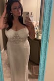 I was really hoping to love this dress! It ran a little large in some areas, didn't support me well in the chest, and the built in cups were odd and too small for me. The waist was loose and it didn't show off my shape well. I loved the beading and the material was nice. It was on the heavier side. - Bailey Y.