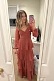 I absolutely love this dress! I got so many compliments on it. It's a little loose at the top so you have to be careful bending over even with tying to bow tight in the back. But overall it's one of my favorite dresses now! - Bailey W.