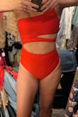 Bought this suit for an upcoming vacation. I always buy up a size to avoid squeezing extra skin. I'm 5'4 133 lbs 32A and large fits perfectly. Color is great. Looking forward to wearing it. - Angela L.