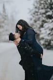 The dress was absolutely perfect for our engagement shoot, even with the snow falling around us. It fit beautifully, looked stunning in the winter setting, and made me feel so elegant and confident. I couldn't have asked for a better choice! - Bluma M.