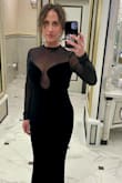 What an absolutely beautiful dress.  Plain and simple yet elegant and sexy.  Form fitting while showing off your curves    The best part is the comfortable material.  Not restricting rather comfy and cozy   Received many compliments.  Danced the entire evening and it never moved. The price was incredible. I would have paid twice the amount for it.   A must have - Jennifer P.