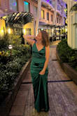 I wore this dress for formal night on a recent cruise. This dress is absolutely gorgeous and flattering in all the right ways. I did have to take the shoulder straps in because I have a short torso, but I wouldn't have gotten a smaller size. And even with 3 inch heels it was dragging on the floor. But I'm still happy with this purchase and can't wait to wear again! - Lisa W.
