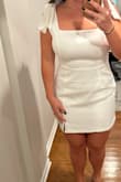 The dress is a bit short, but SO cute and flattering. If you have curves, it hugs it perfectly, have gotten so many compliments. Planning to wear it on my bachelorette trip but it will definitely get worn other times. - Jo T.