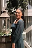 Such a beautiful dress. Was extremely long and had to get it tailored. (I'm 4'11)... I tend to order a small but the small didn't fit and this is a size medium. Was still too snug for me. I don't think they are accurate with sizing. - Esther L.