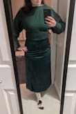 I normally wear a s-m in Lulus bottoms. I ordered the medium because it was fitted and I couldn't hardly get it over my thighs I was even considering getting an XL when I exchanged it. But I got the L and it fits fine but I probably could have gotten the XL and also been fine. I also bought this green sweater to match and the colors go together perfectly. It reminds me of all these ads for the satin skirts and cashmere sweater sets on Pinterest right now. - Amalia F.