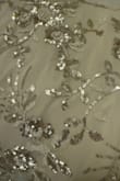 The dress fit true to size, but it came as a more taupe color instead of cream. It was so disappointing that the color wasn't as expected. I will be returning this. - Andrea L.