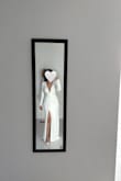 The fabric is amazing, a little bit stretchy. It's very sexy and elegant at the same time, as it has a leg slit, a plunging neckline and low back.
It comes with its garment bag, which is very helpful. - Diana S.