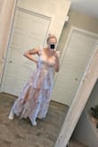 Dress is just as pictured! Fits true to size too. Definitely recommend! - Linda A.