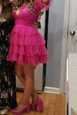 I bought this dress for Glam in the City Mom Prom. It was super comfortable and I got compliments ALL night long. The front is pretty open. I used fashion tape to keep the ladies in place. I also had to cut the white dress holder straps because they wouldn't stay in, but it was a super comfortable and very flattering dress. - Shannon R.