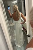 This dress is classic and elegant. The low back and the bow add a little flair. It's fully lined so no undergarments are required, but I purchased nipple petals for a little added coverage. I am wearing this to a charity event and I'm so excited! Trying to decide on shoes and accessories! - Erin H.