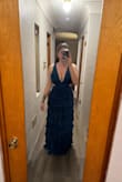 This dress is stunning. I ordered a Medium and a Large with the intention of returning the size that did not fit. I was expecting to fit the large, but after reading some reviews, I figured I'd try the medium. While the large does fit just fine and there is no tightness to it, but there is not as much "snatch" to it as the medium. I was pleasantly surprised being a 34DDD and this top holding it all in. It comes with pads. No bra necessary. I may use tape but I think I'd be fine to go without. Beware it does collect hair being a softer satin material. First photo is the large. Second is the medium - Machenze L.