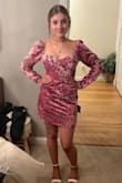 I love the unique print and velvet fabric of the dress. It's very flattering. Not too snug not too loose. It's adorable! - Rebecca B.