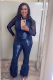 I received so many compliments. This is absolutely beautiful and fits just right on the body. Bottom of the jumpsuit is feathers, adding the right amount of elegance - Shereno M.