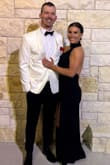 Dress was PERFECT! Great fit with a little stretch/give. Flattering neckline, great length and wore with heels. - Skylar A.