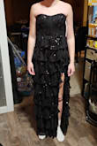 Dress itself was fine, good condition, shipped fast. Daughter's thin build and lack of hips just made it unflattering on her body type. Slit was higher than she felt comfortable wearing. Felt length was a bit too short with heels on. Returned for something she liked better. - Jeanette B.