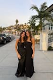 I purchased this dress for my best friend's wedding. It was a very small intimate wedding and reception so it was perfect for the occasion. I love it because I can wear it again to another wedding or event as a guest! I am between a 4 and 6. I purchased the small because its strapless and flowy on the bottom and it was perfect. I'm a little over 5'9, and without heels, it covers my feet. The drop waist is so flattering and cute and the dress itself is very comfortable. The change to a pleated bottom is a subtle change and doesn't look drastic in pictures. Also, the strings to hang up the dress kept coming out, so if you don't already, I would just cut them out. - Reilly J.